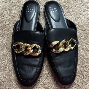 A New Day Black Mules with Gold Chain Accent
